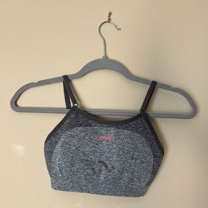 Gymshark sports bra. New, never been worn. Charcoal gray w/ pink logo.